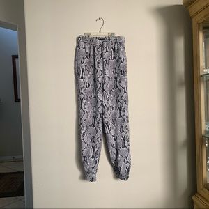Ankle High Rise Snake Patterned Pants by Express. Size XS. Only woken twice.